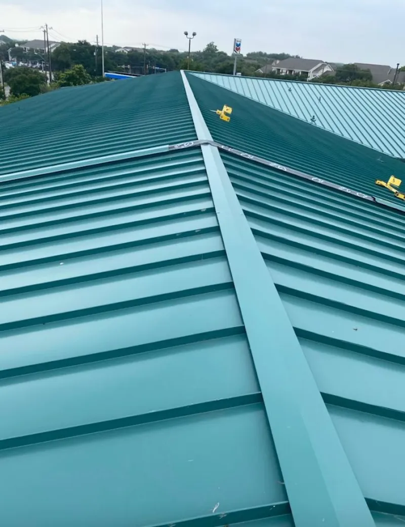 Green commercial metal roof ridge and valley for Metal Roof Repair in Coral Terrace